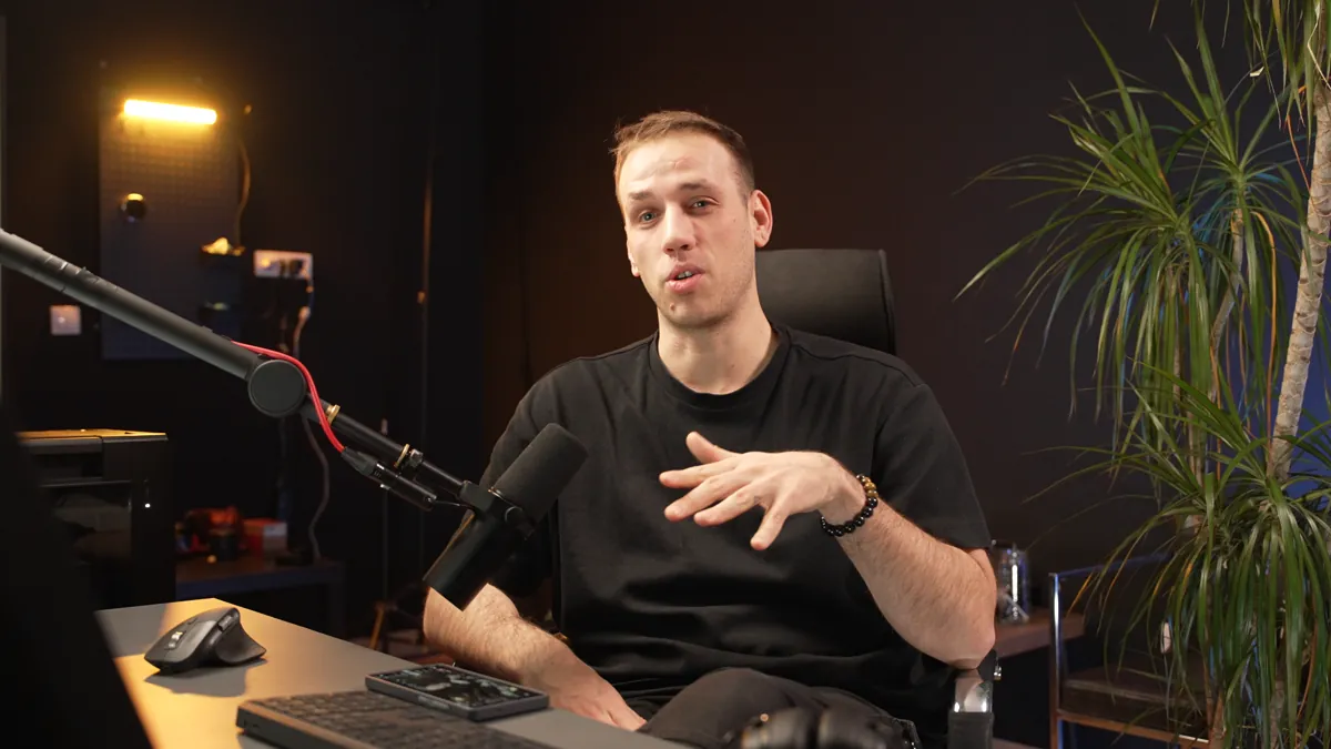 A frame of the raw take: Luka at his desk, talking to the camera